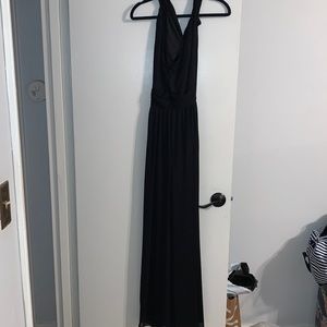 A black bridesmaids dress never worn, never altered size 12.